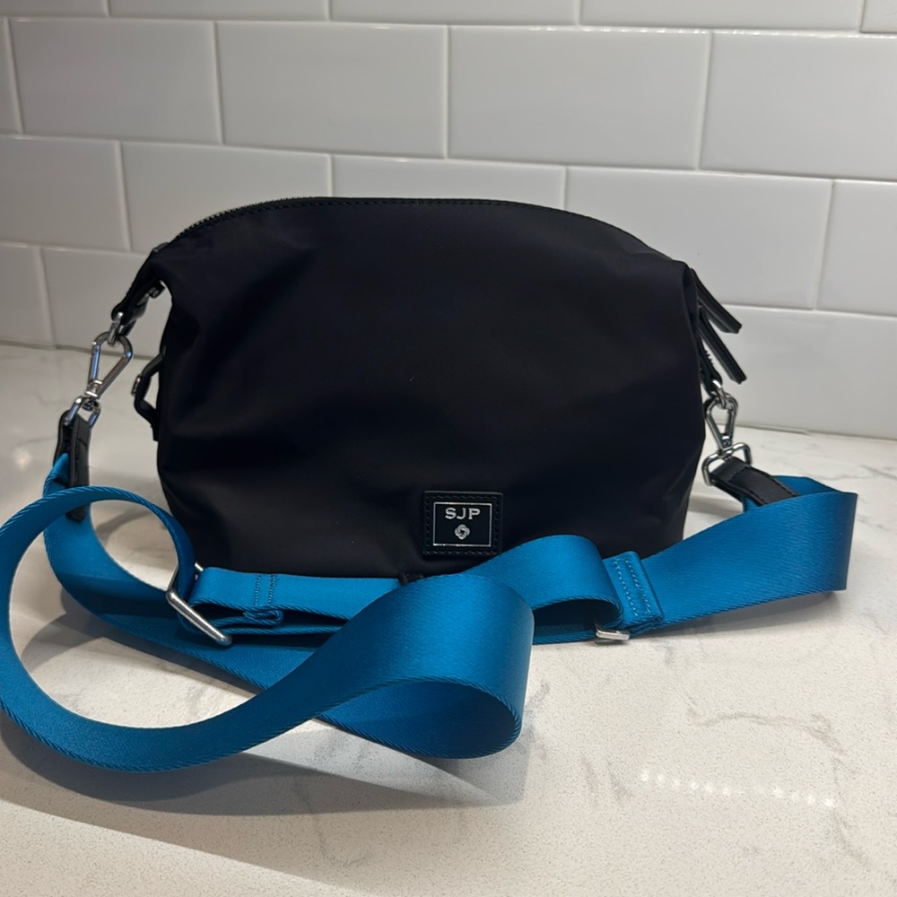 SJP black crossbody with turquoise strap NWOT